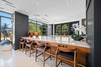 Entertaining kitchen and resident social lounge with plenty of cozy seating for gathering and entertaining friends